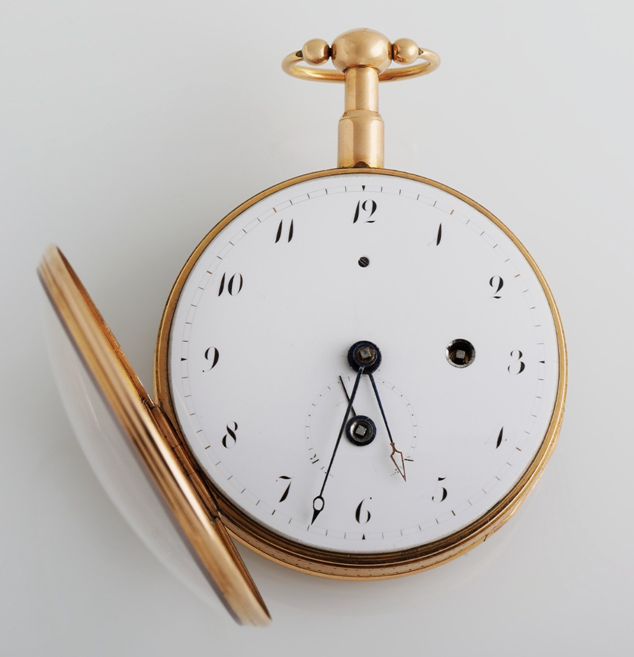 Montre de poche en or ouverte, cadran émaillé